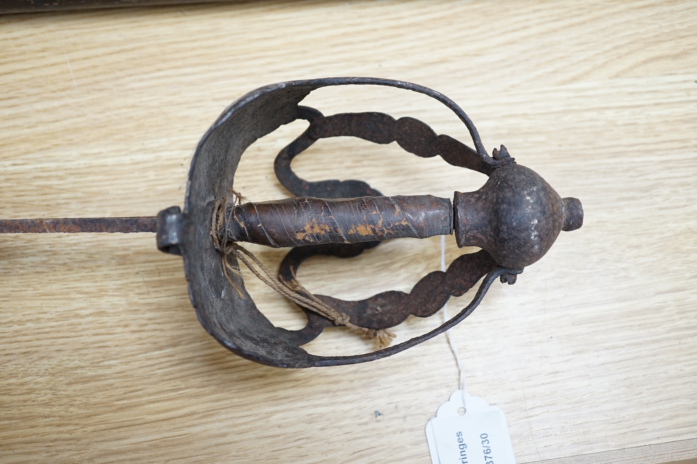 An early pike, a basket hilt sword and a French bayonet. longest 193cm